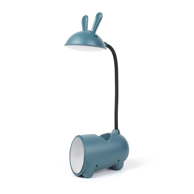 Cartoon-themed desktop table lamp with integrated pen container in green colour