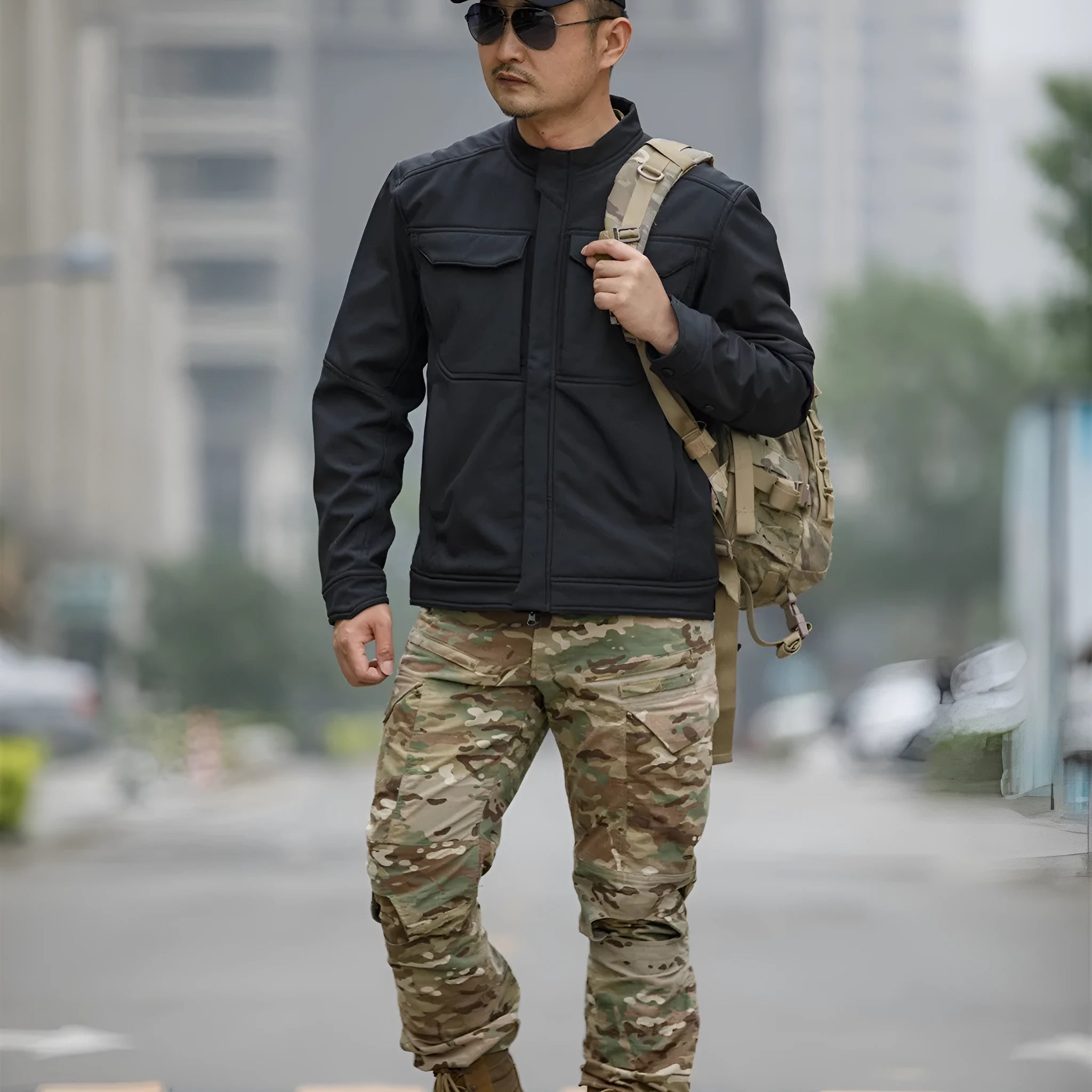 Bone Frog Peak Breaker soft shell tactical jacket in black camouflage for mountaineering.