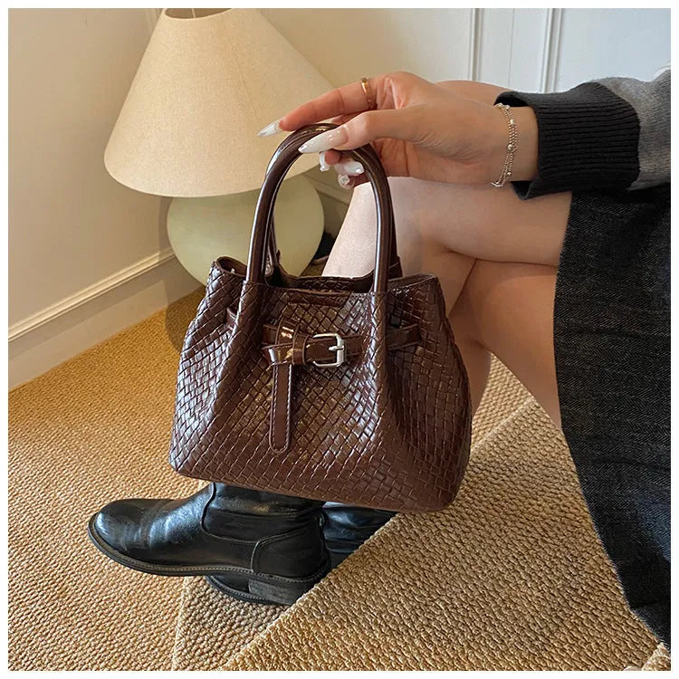 Soft PU bucket messenger handbag for women with spliced exterior and outer pocket, black colour option