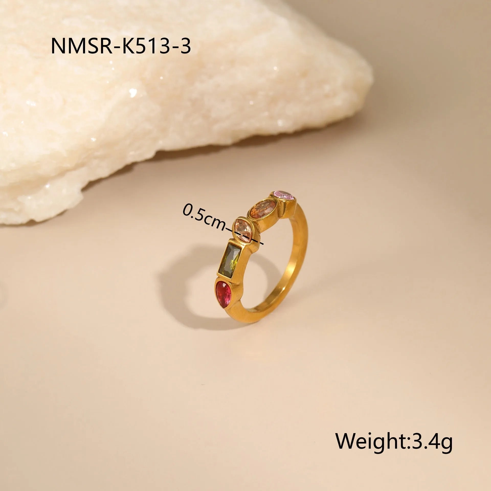 Geometric gold-plated jewellery set with colour zircon stones, showing necklace, ring, and earrings.