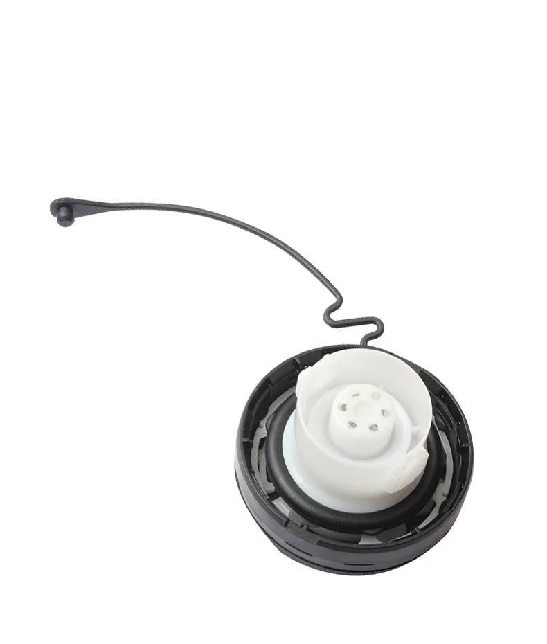Black snap-on fuel tank cap for Toyota vehicle replacement.