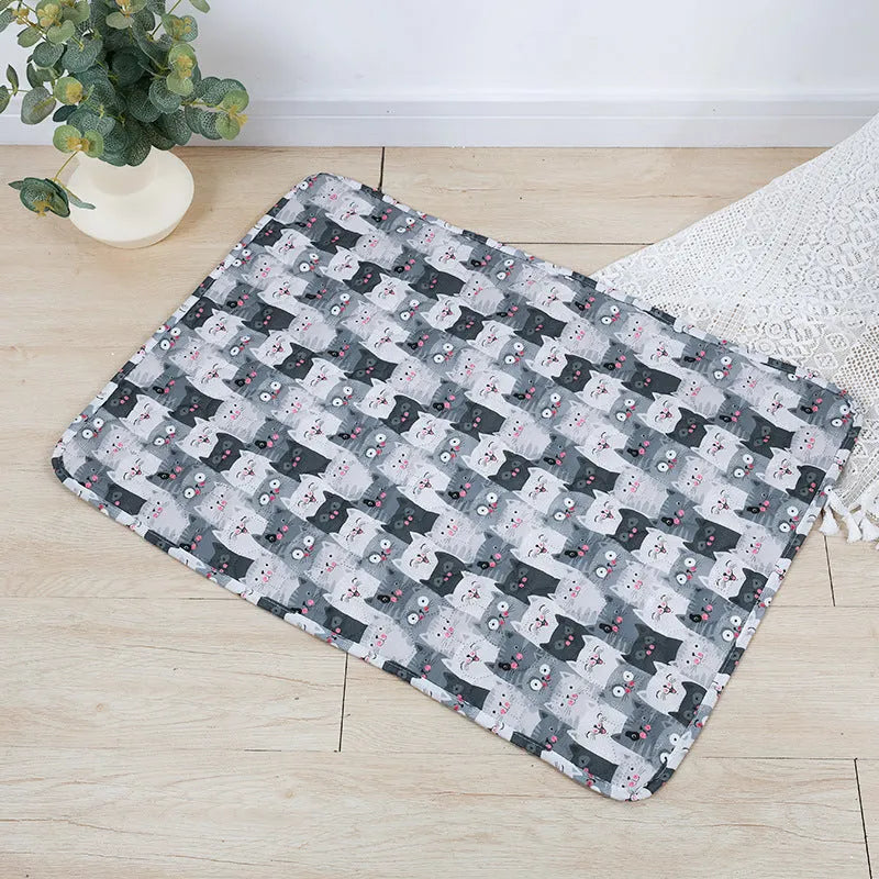 Reusable waterproof pet urine pad with animal print design and non-slip cloth backing