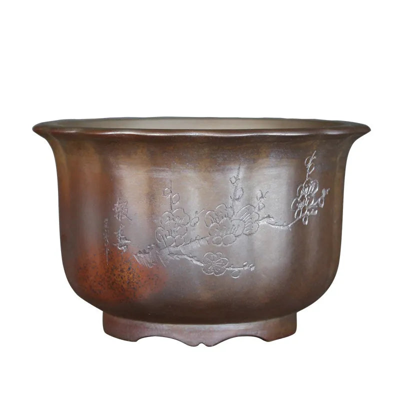 Indoor antique carved ceramic flowerpot in purple sand with a wood-burning finish, shown in large size.