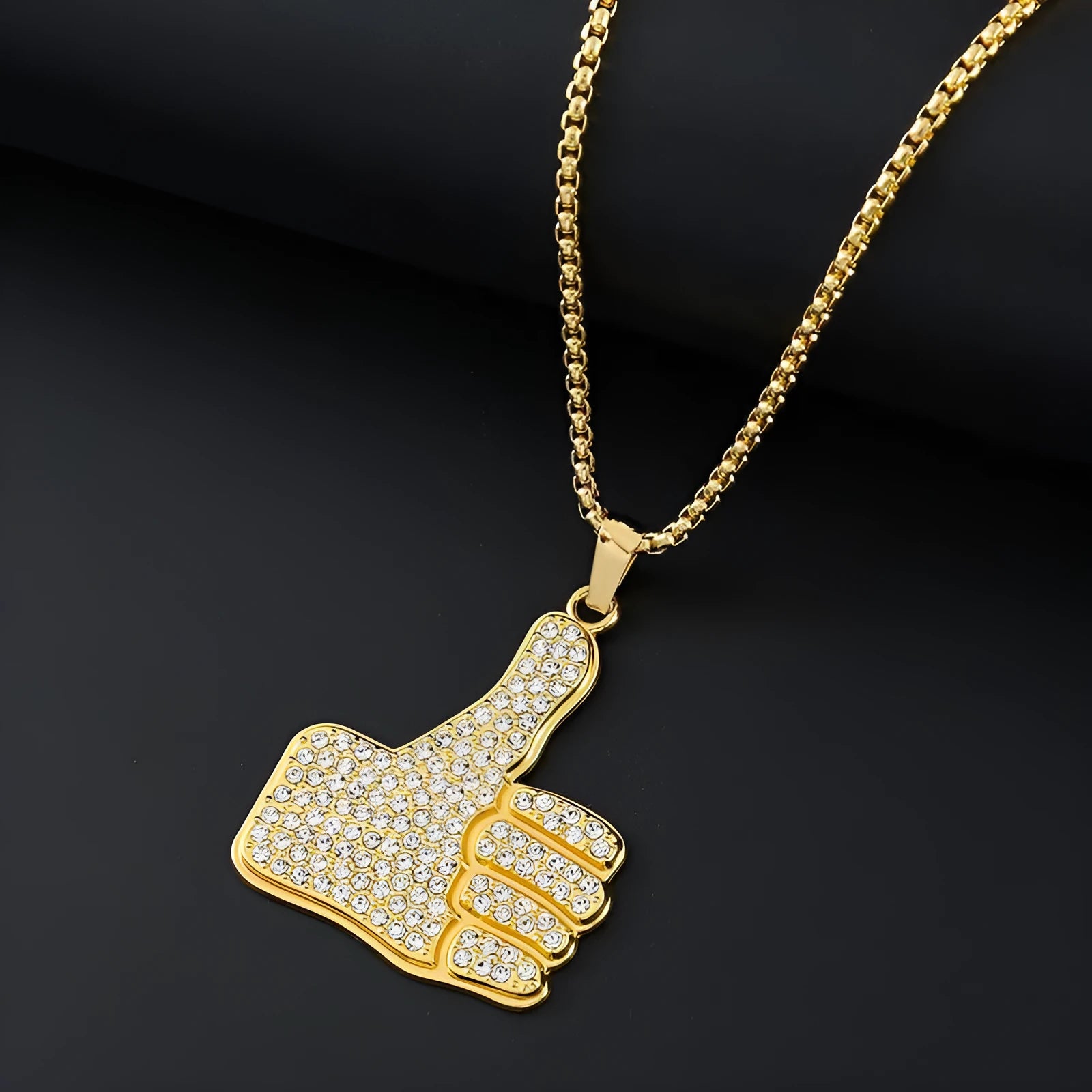 Gold geometric alloy pendant necklace with inlaid diamond-treated zirconia stones.