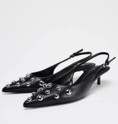 Women's black low-cut pointed-toe wedge stiletto heels with rivet decoration and slip-on design