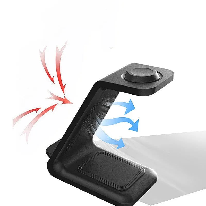 White 3-in-1 wireless charging stand holding a mobile phone, smartwatch, and earbuds on a wooden desk.