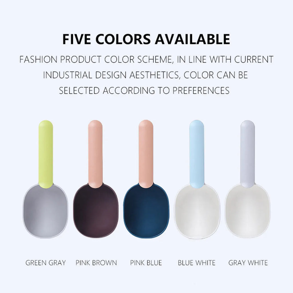 Blue plastic pet food scoop with ergonomic handle and bag clip on a white background
