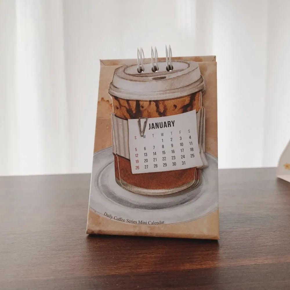 Mini 2025 desk calendar with themed designs for small desk spaces