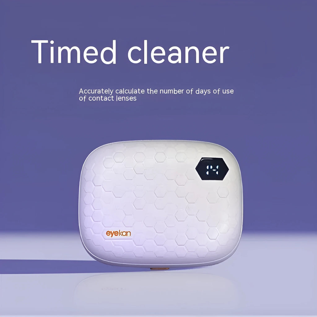 Pearl white automatic ultrasonic flushing instrument for cleaning invisible glasses on a table.