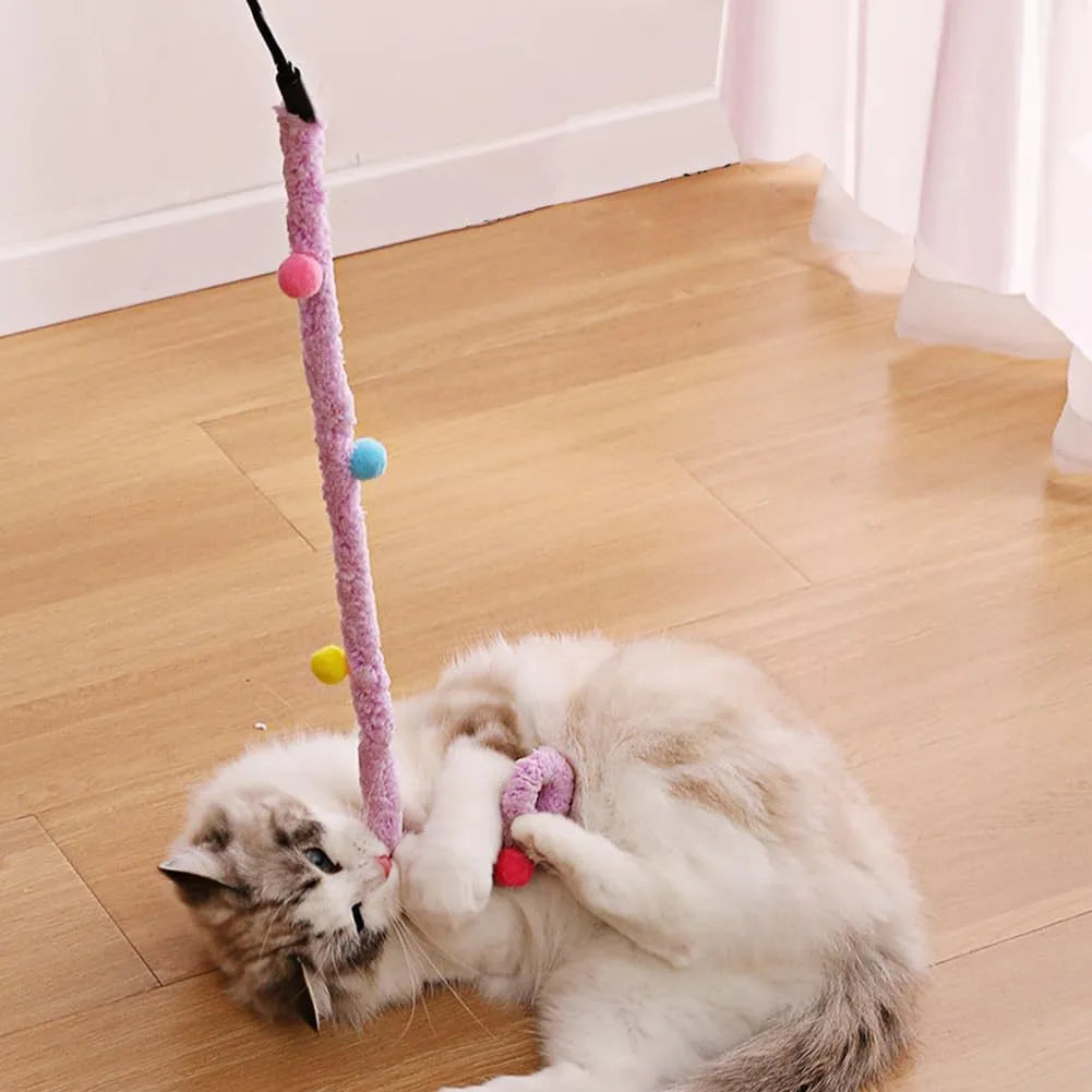 Blue green or pink cat wand toy with plush strip and bell for interactive indoor play