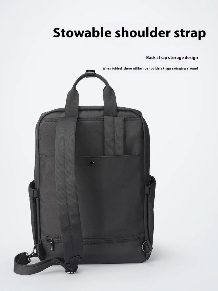 Black Oxford cloth computer backpack showing organisational storage compartments and laptop section