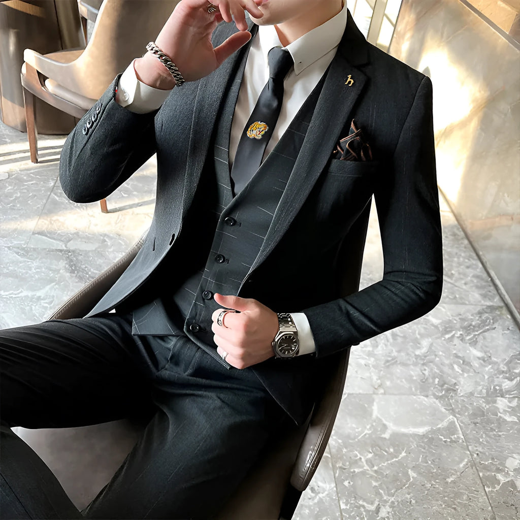 Slim fit men's business suit in British style cut, available in black or dark grey cotton blend fabric