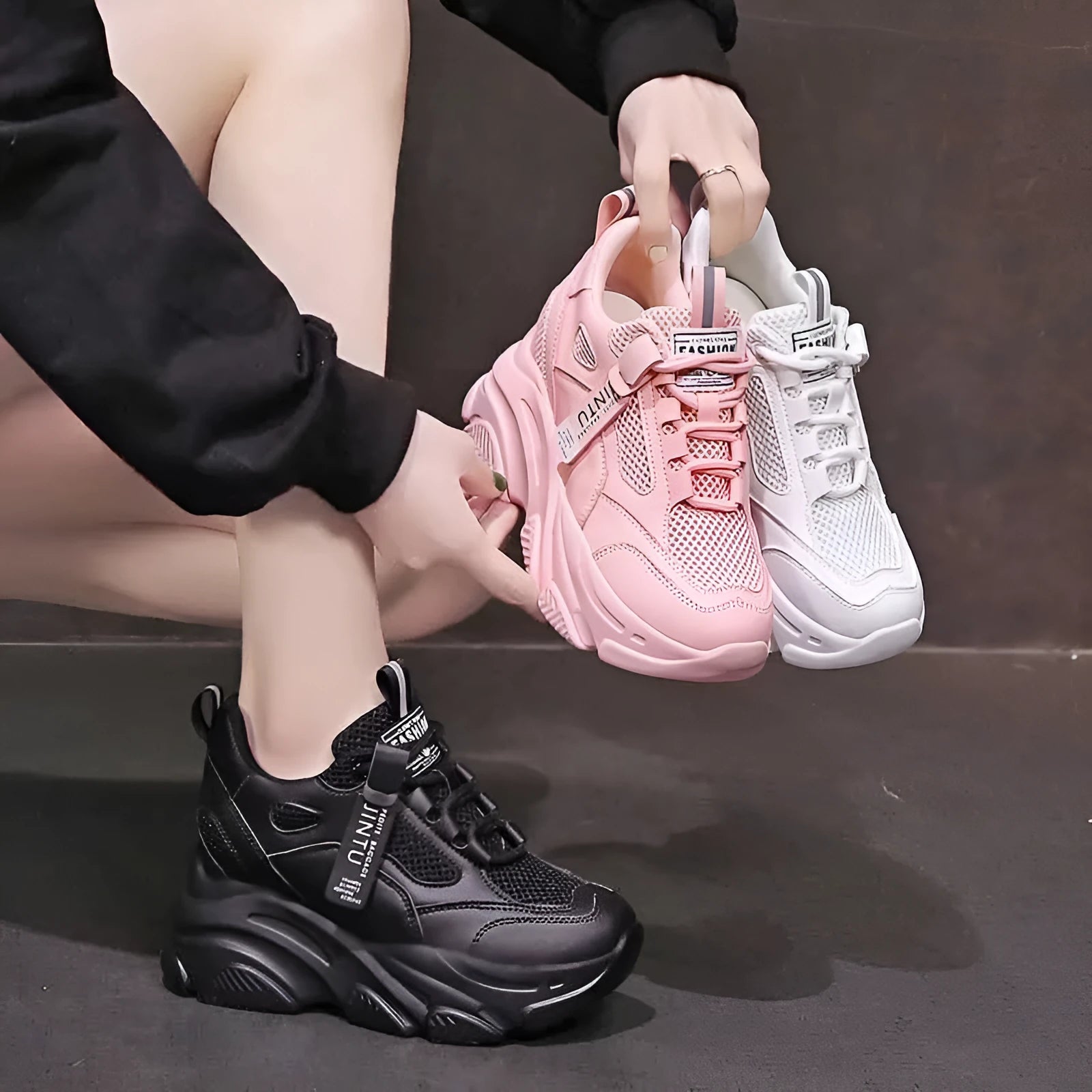 Women's black mesh platform casual shoes with hollow-out design and toe holder on a TPR sole.
