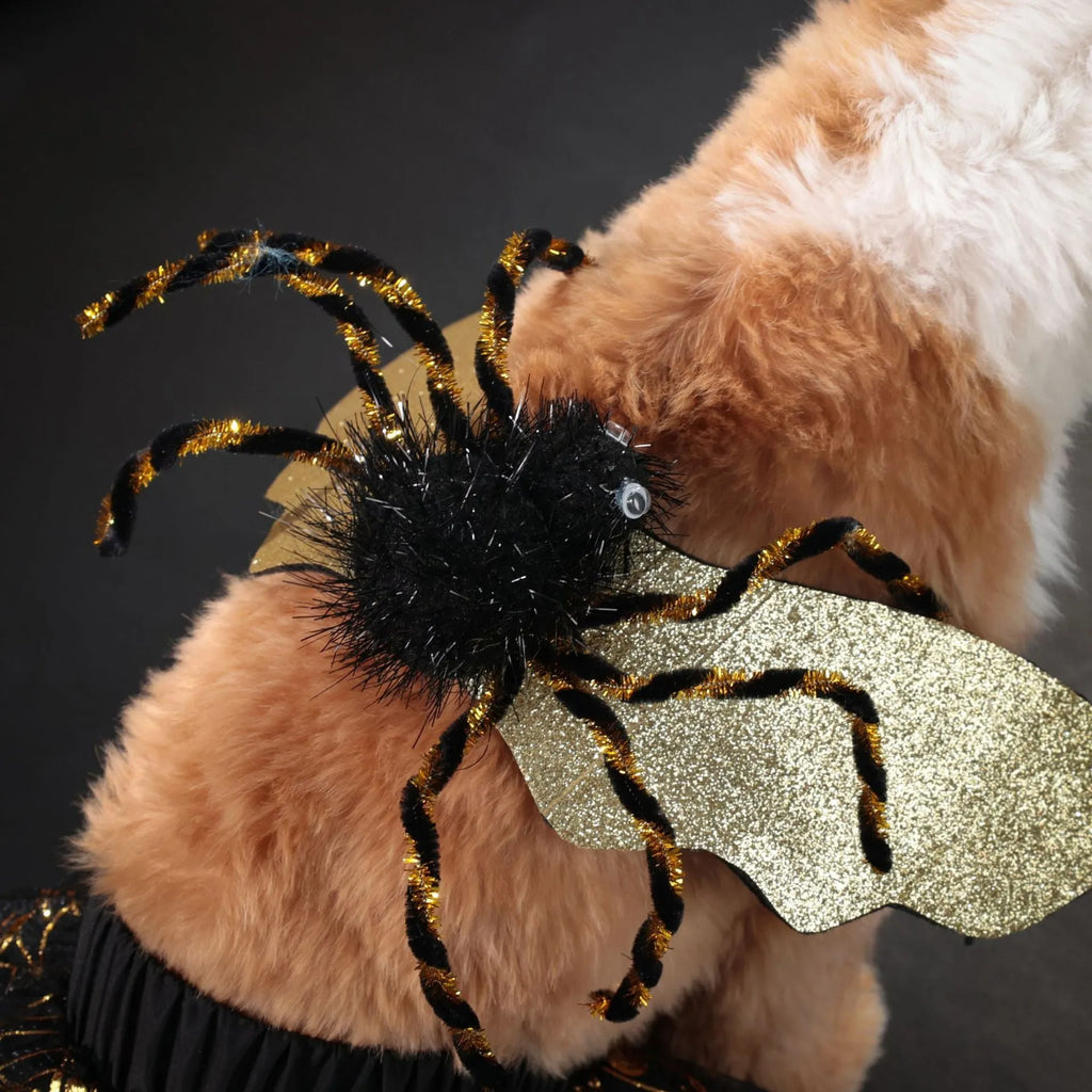 A dog wearing a classic suit-style Halloween costume, available in sizes small to extra large.