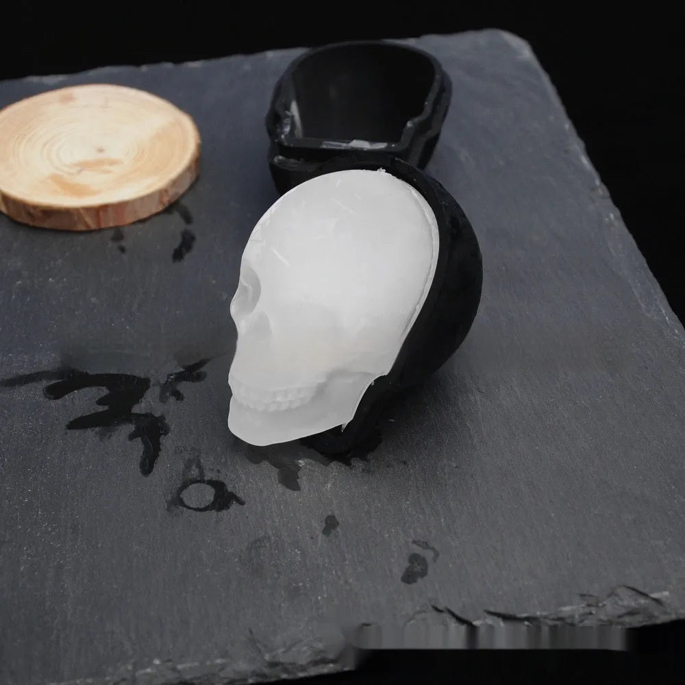 Food grade silicone Halloween ice tray creating 3D skull shaped ice cubes.