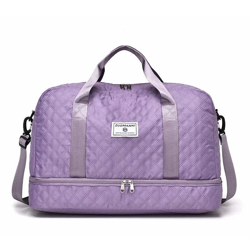 Large Oxford cloth travel bag in a solid colour showing its spacious design and street style details.