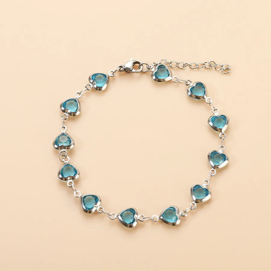 Geometric heart bracelet with colourful electroplated finish on stainless steel, unisex design