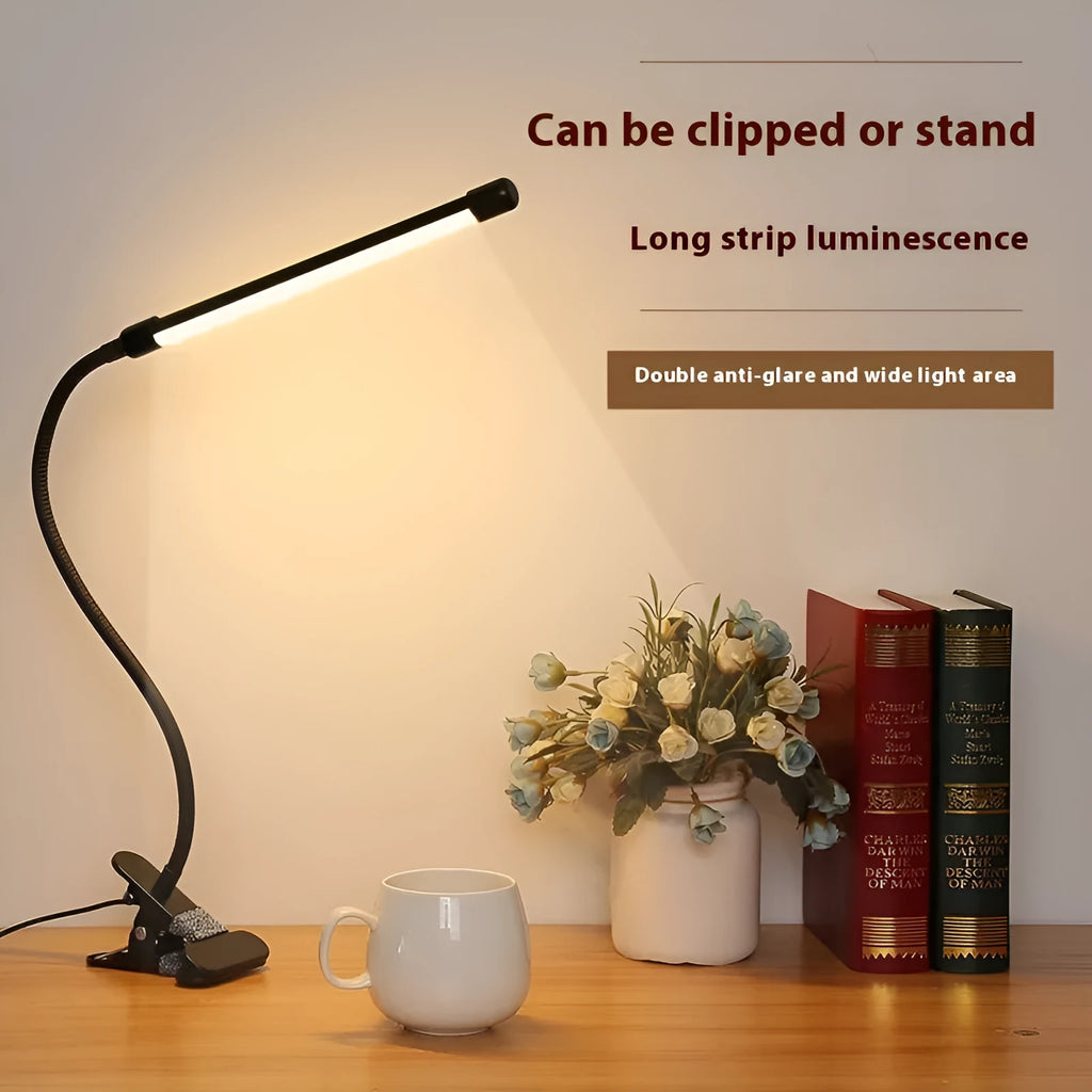 Black and white USB-powered LED desk lamp with 26cm length for study desks.