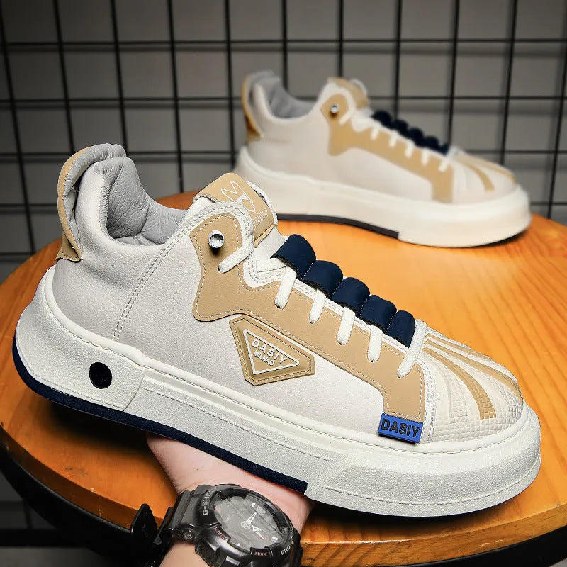 Men's beige low-top casual slip-on shoes with elastic band and leather stitching.