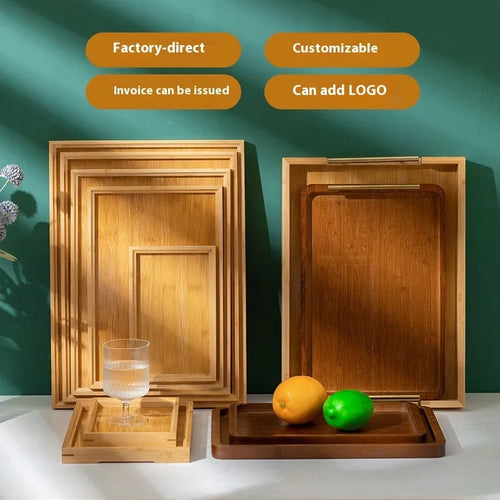Square bamboo serving tray with brown handle on solid colour surface