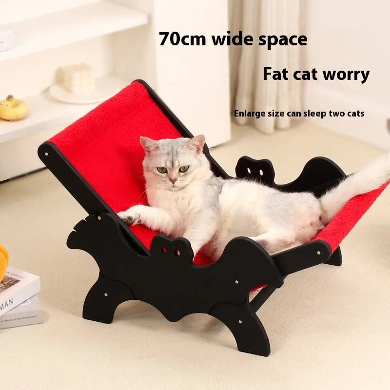 Black and red Halloween-themed wooden cat recliner bed with slatted frame.