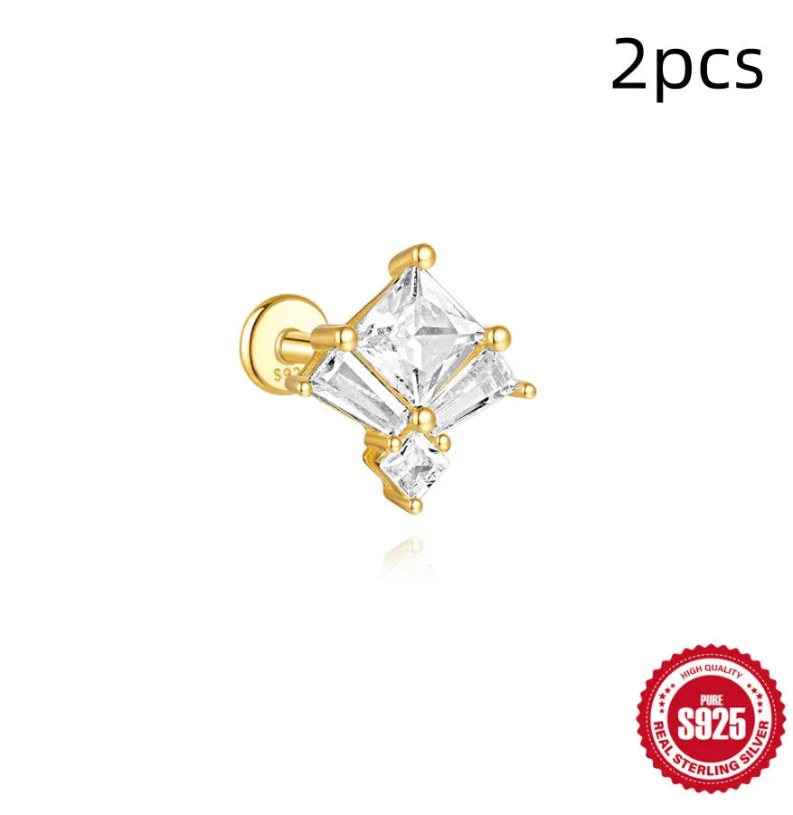 Sterling silver chain stud earrings with zircon inlay in geometric shapes including clover and crown designs