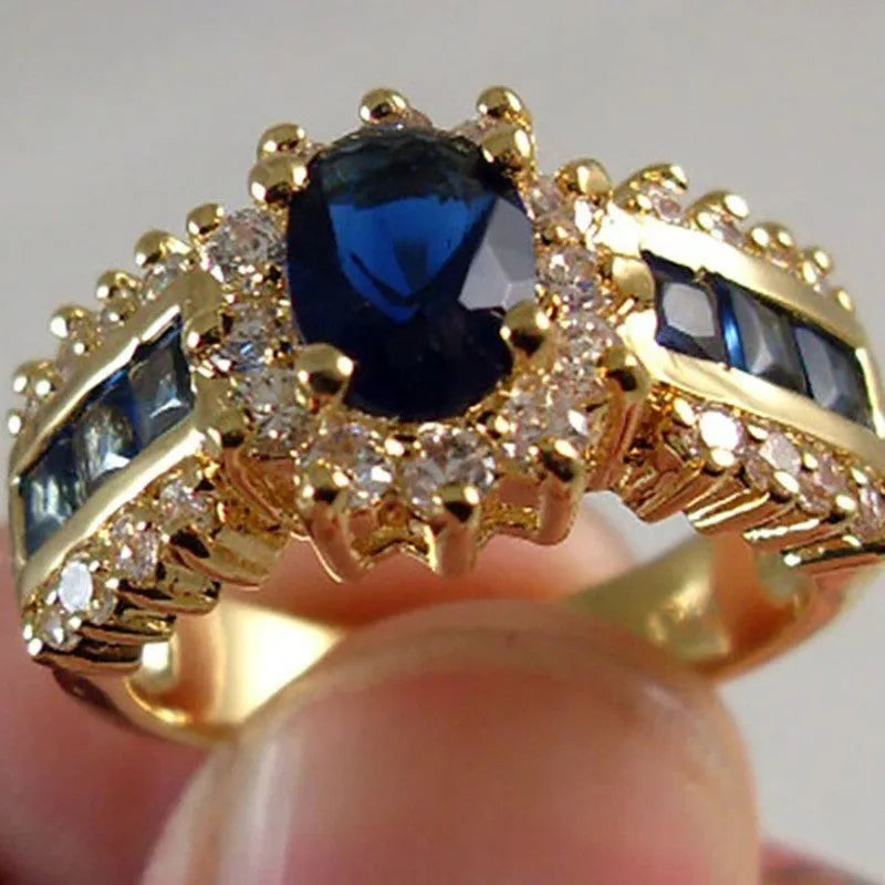 Personalised zinc alloy ring with cubic zirconia stones in sunflower blue, square blue, or square purple designs