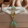 Green jade bracelet with abacus beads and electroplated butterfly tassel decoration