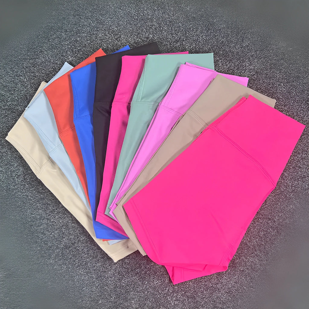 Women's high waist yoga shorts in nylon fabric for running and sports, shown in a selection of colours.