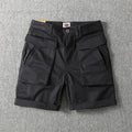 Men's straight-leg cargo shorts in army green with multiple pockets, made from stretch cotton fabric.