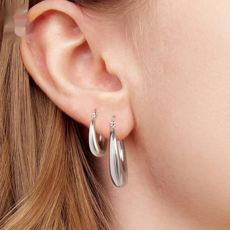 Copper geometric ring ear clip earrings with silver electroplated finish