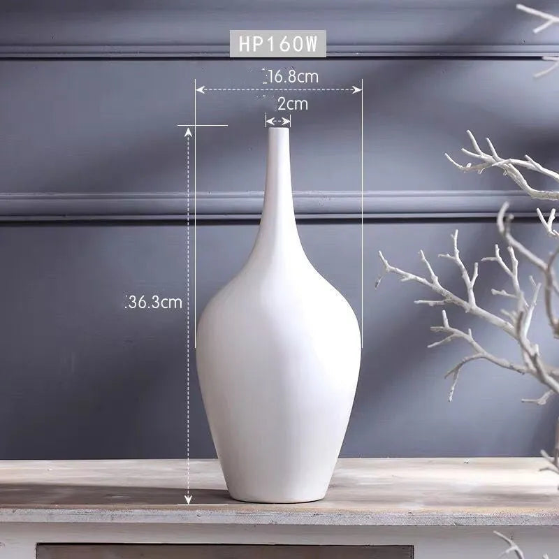 Tall white matte glaze ceramic vase HP160 on desktop with flowers