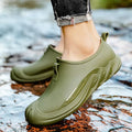 Men's short plastic rain boots in black on white background