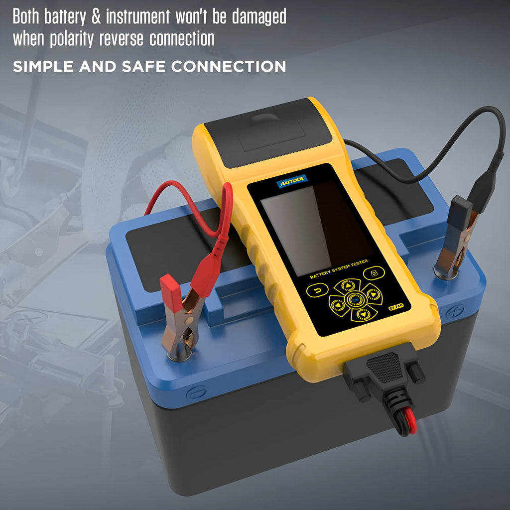 Autool BT760 vehicle battery tester with colour screen and attached test clips on a workbench.