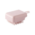 Pet bath brush with soft TPR combs for dog and cat grooming, available in blue, pink, white, and yellow.