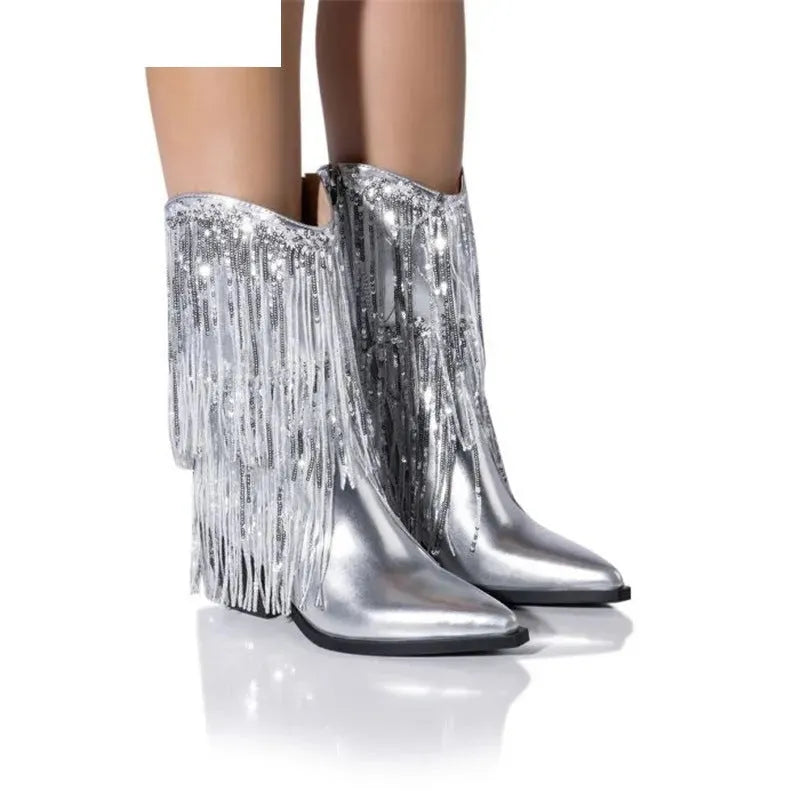 Women's black chunky heel tassel ankle boots with a pointed toe and high stiletto heel.