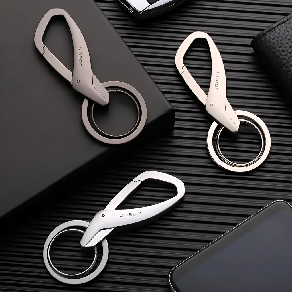 Black zinc alloy double ring keychain for car keys, shown attached to a belt loop.