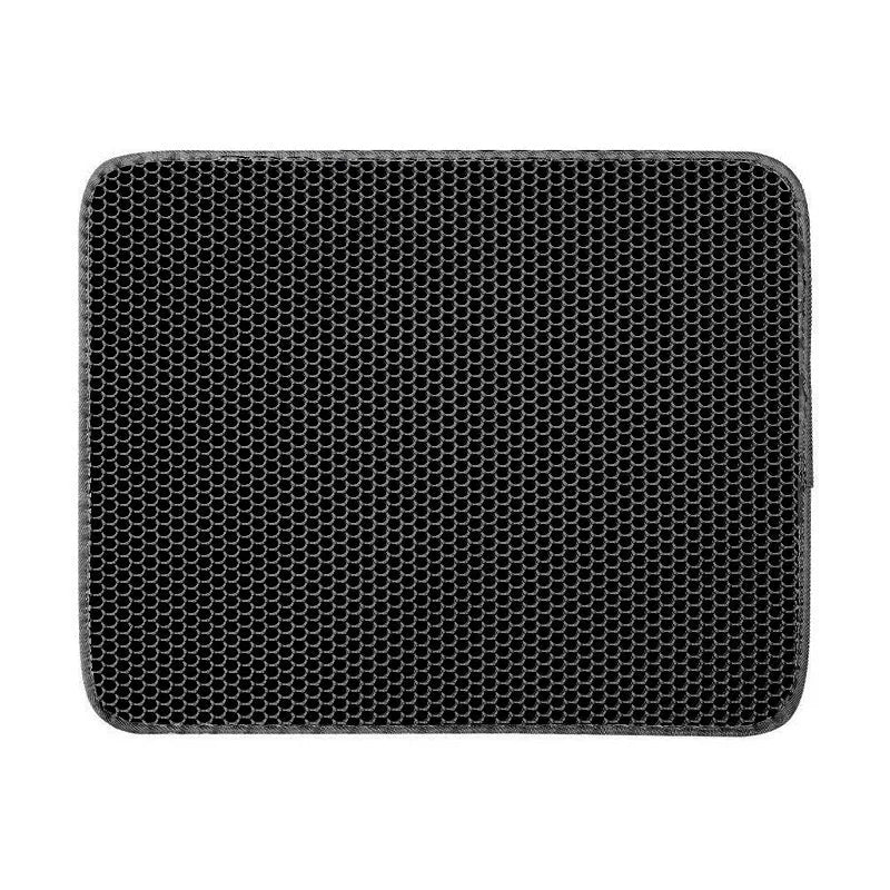 Black honeycomb double layer cat litter mat with non-slip bottom placed near litter box