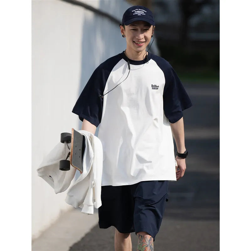 Japanese junior raglan sleeve t-shirt for men in blue, green, or grey with loose pullover style