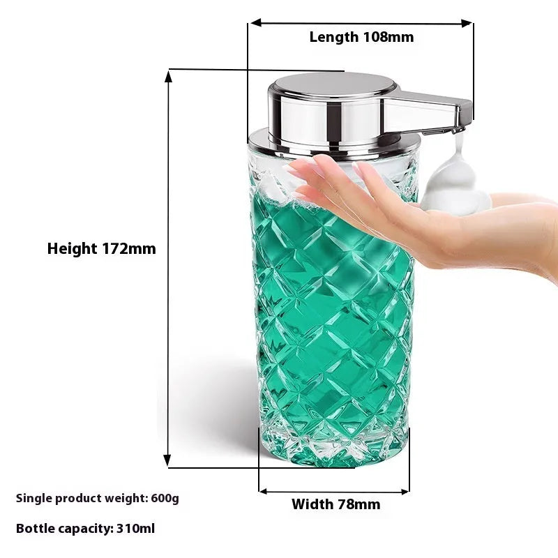 Silver automatic soap dispenser with USB Type-C charging port on a bathroom countertop.