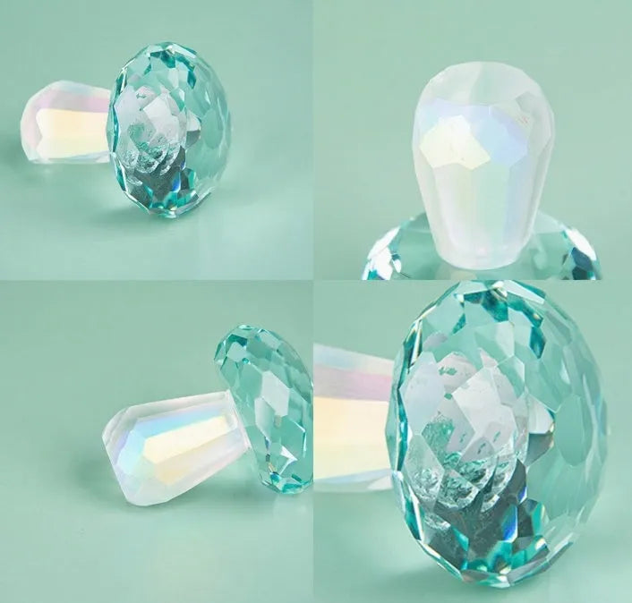 Small solid crystal mushroom ornament in modern geometric style on a wooden surface.