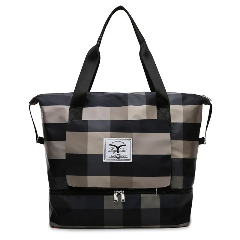 Foldable travel duffel bag in black, dark blue or wine red with 20-35L capacity and dry wet separation