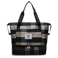 Foldable travel duffel bag in black, dark blue or wine red with 20-35L capacity and dry wet separation