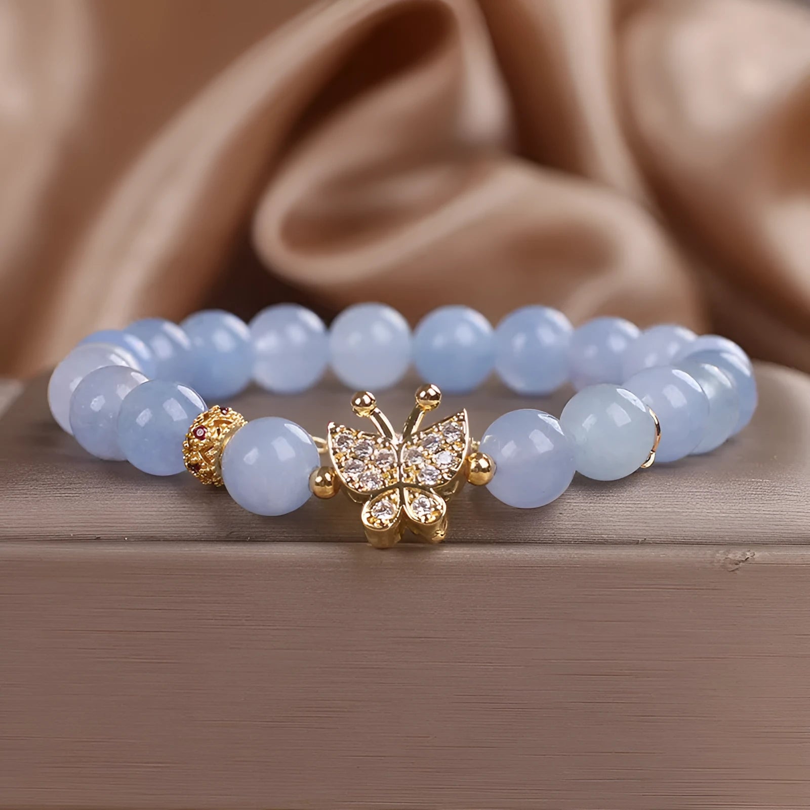 Sky blue butterfly crystal bracelet for women with pearl and rhinestone details