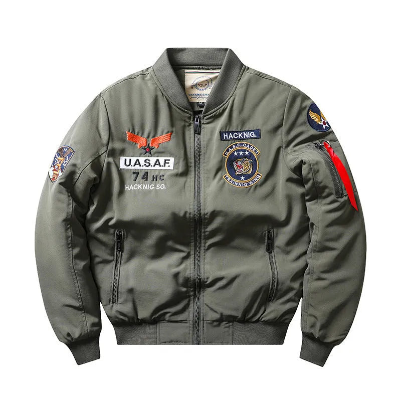 Man wearing a slim-fit black retro motorcycle jacket with stand collar and quilted padding.