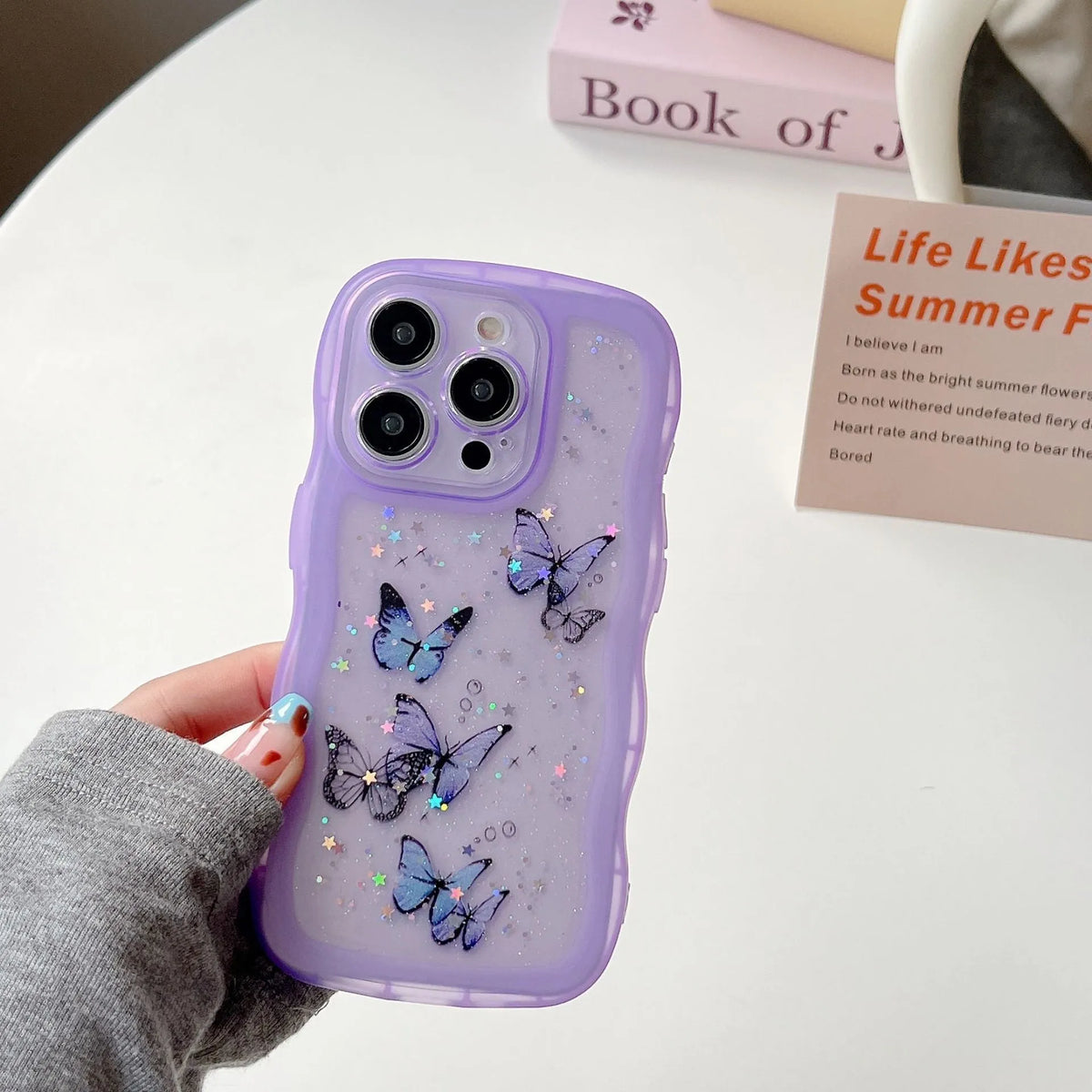 TPU transparent protective phone cover with painted butterfly glitter design and wave pattern for iPhone models