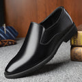 Men's black business casual slip-on shoes with renewable leather upper and rubber sole