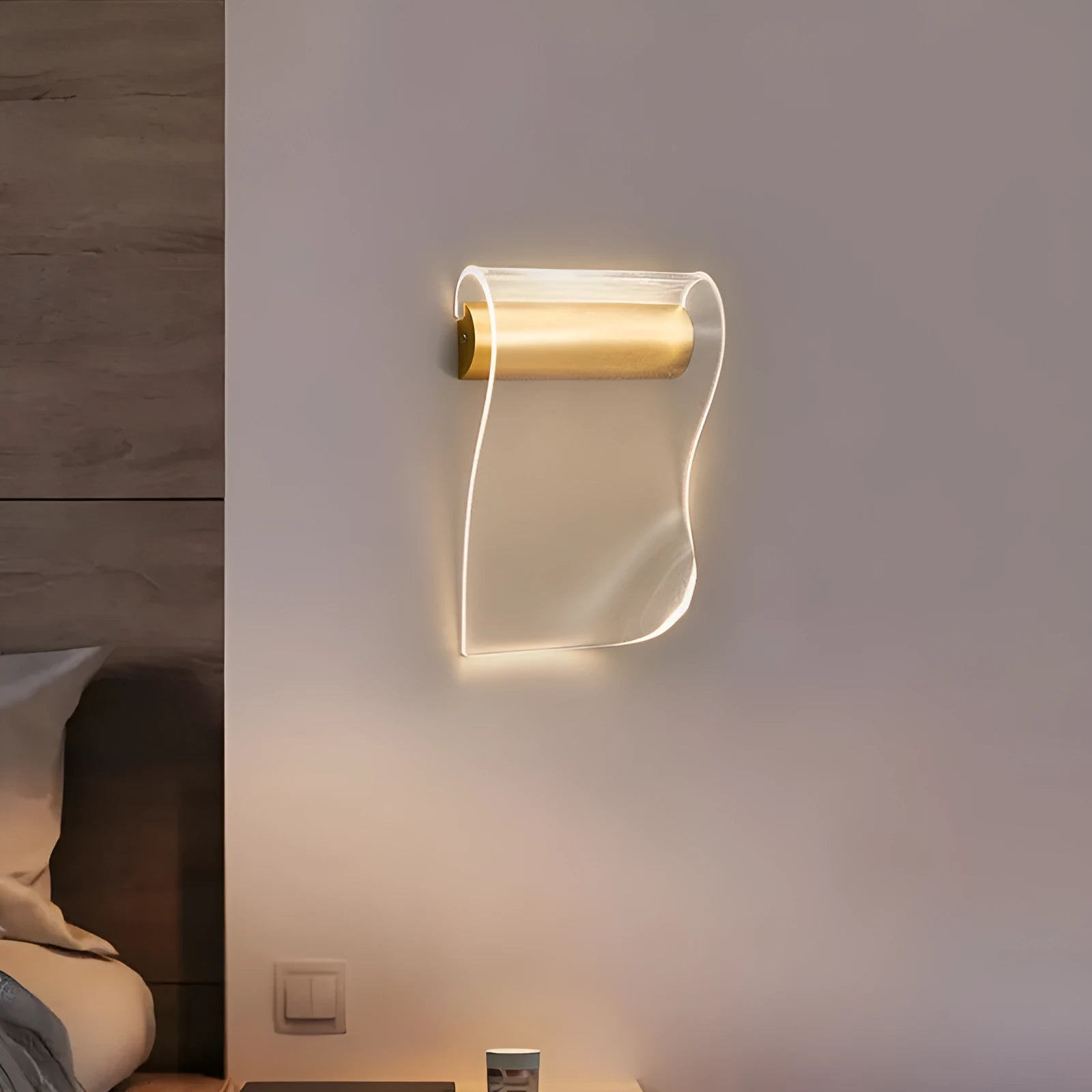 Simple wall lamp with choice of left or right bend arm, acrylic shade, and integrated LED light