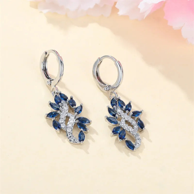 Women's platinum sapphire blue alloy earrings with simple minority design