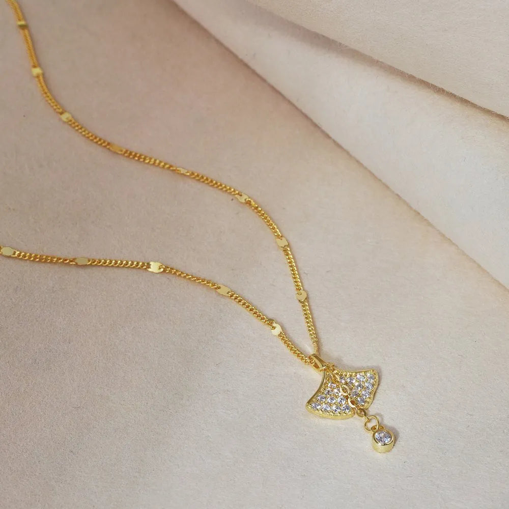 S925 sterling silver necklace with ginkgo leaf pendant in gold finish on curbs chain for women